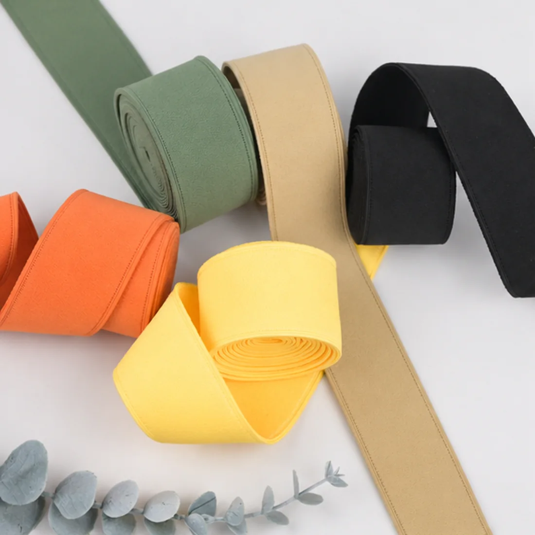 Real colorful garment elastic assortment photographed for B2B material selection