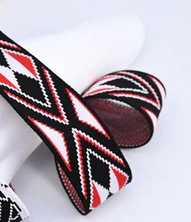 Black, white and red tape with repeating diamond patterns