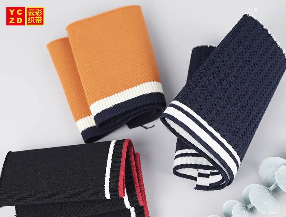Orange, navy and black rib-knit pieces with contrasting edges