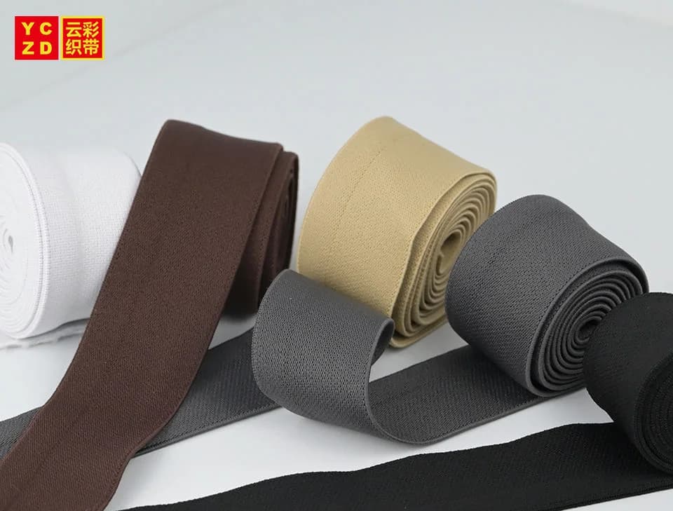 White, brown, beige and grey tapes displayed in a row