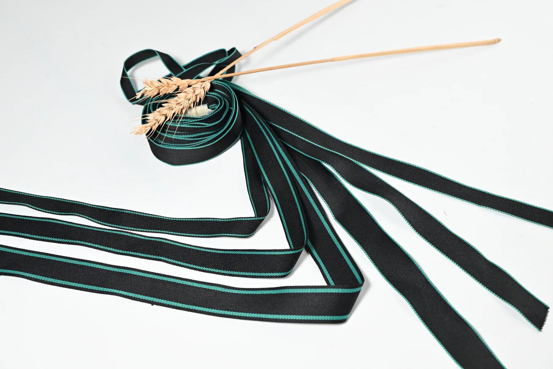 Custom jacquard webbing samples with woven logos, patterns and contrasting colours