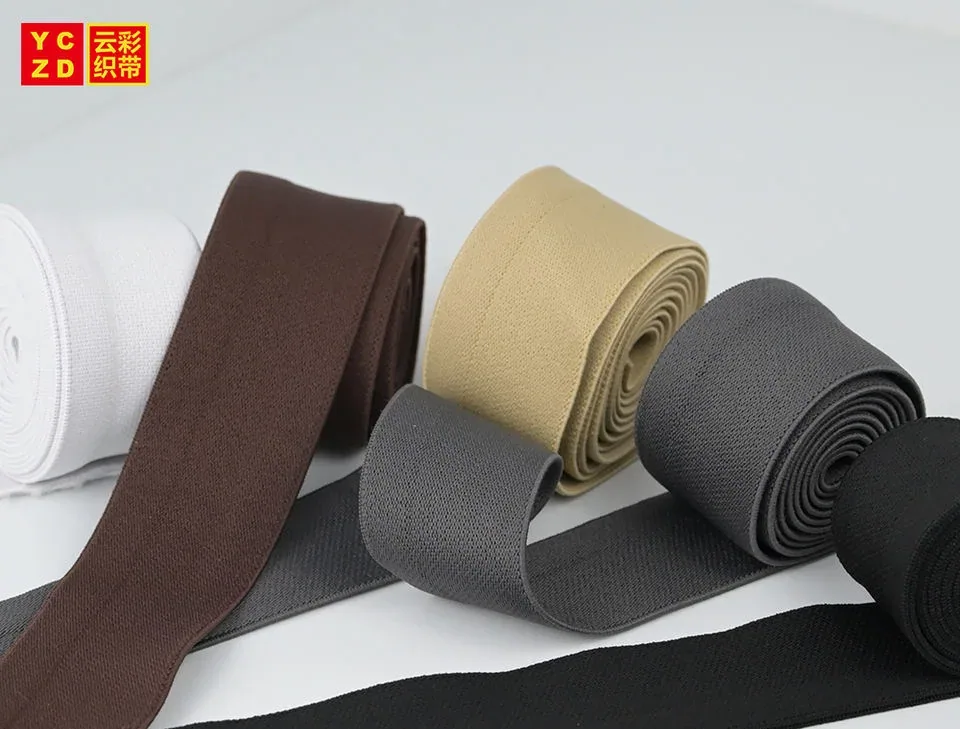 White, brown, beige and grey tapes displayed in a row