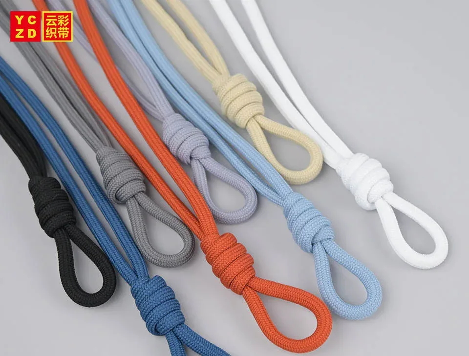 Knotted drawcords in orange, blue, grey, cream and white
