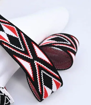 Black, white and red tape with repeating diamond patterns